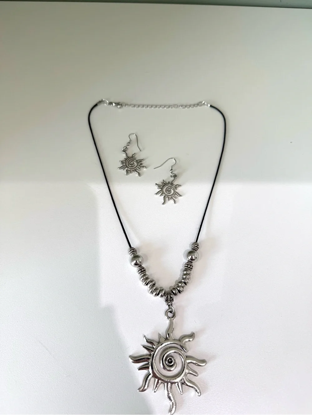 Silver Sunburst Pendant Necklace and Earring Set -